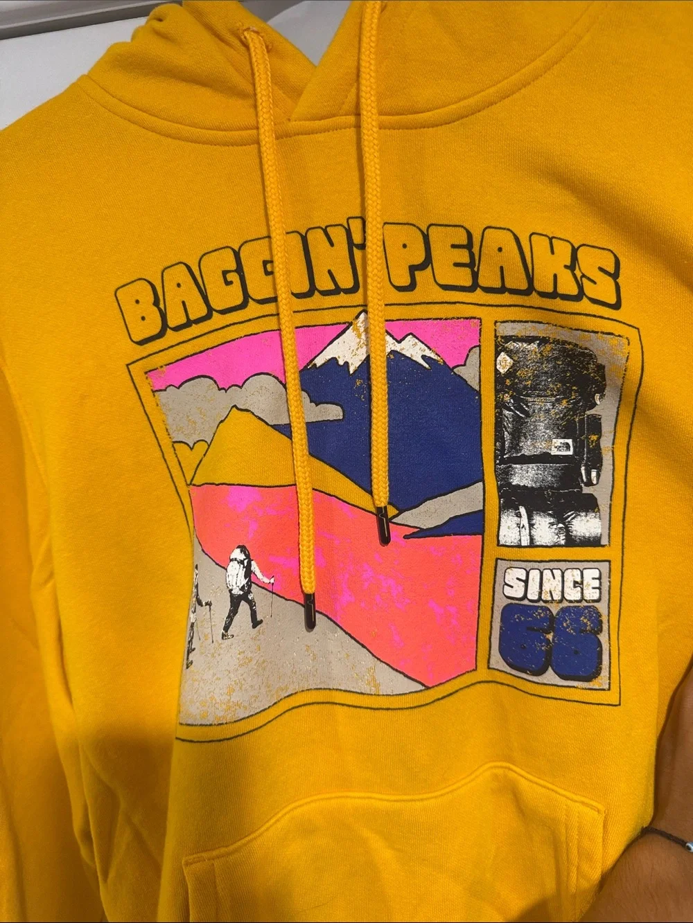 The North Face Baggin’ Peaks Graphic Hoodie Yellow Pullover Sweatshirt